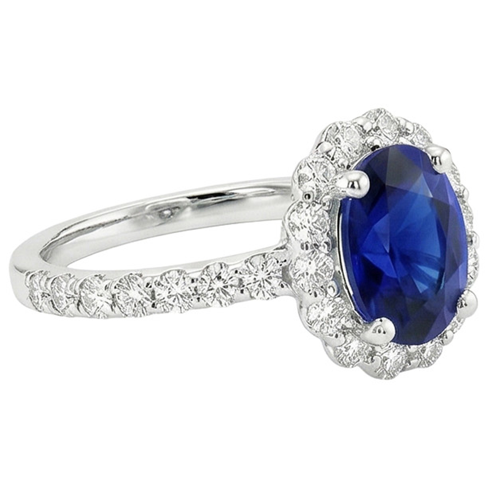 Anello di fidanzamento con alone blu zaffiro ovale e diamanti rotondi 5.50 carati