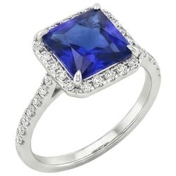 Anello di fidanzamento con diamante rotondo e zaffiro blu con accenti 6 carati