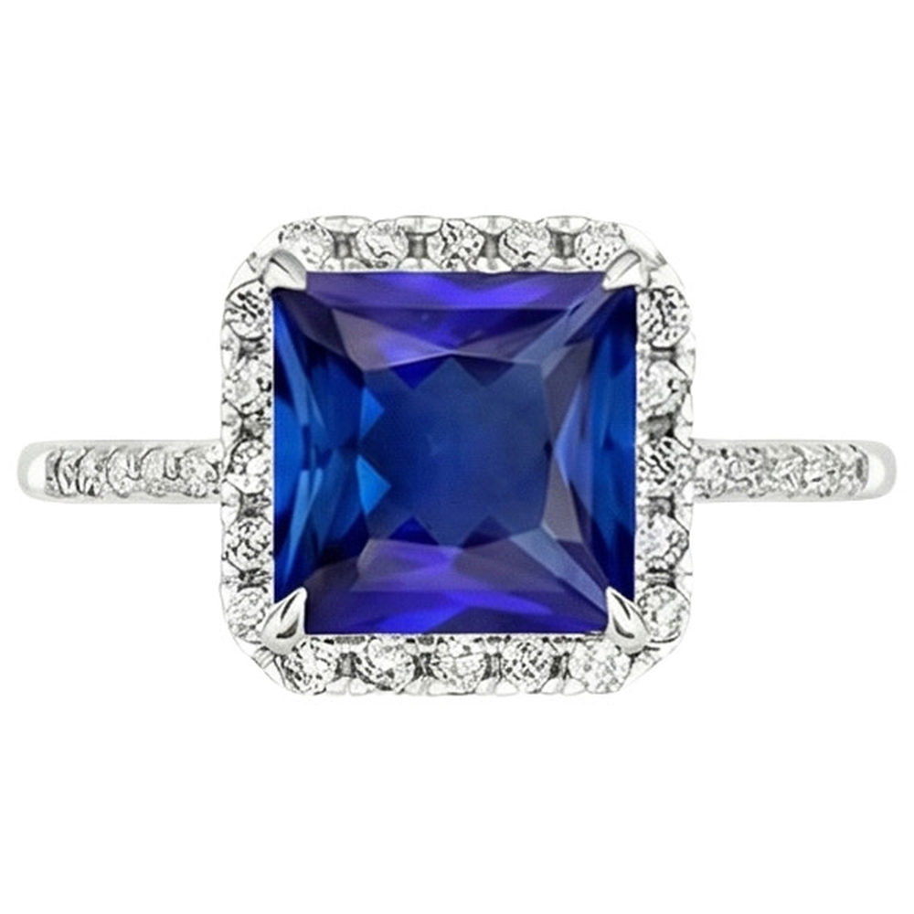 Anello di fidanzamento con diamante rotondo e zaffiro blu con accenti 6 carati