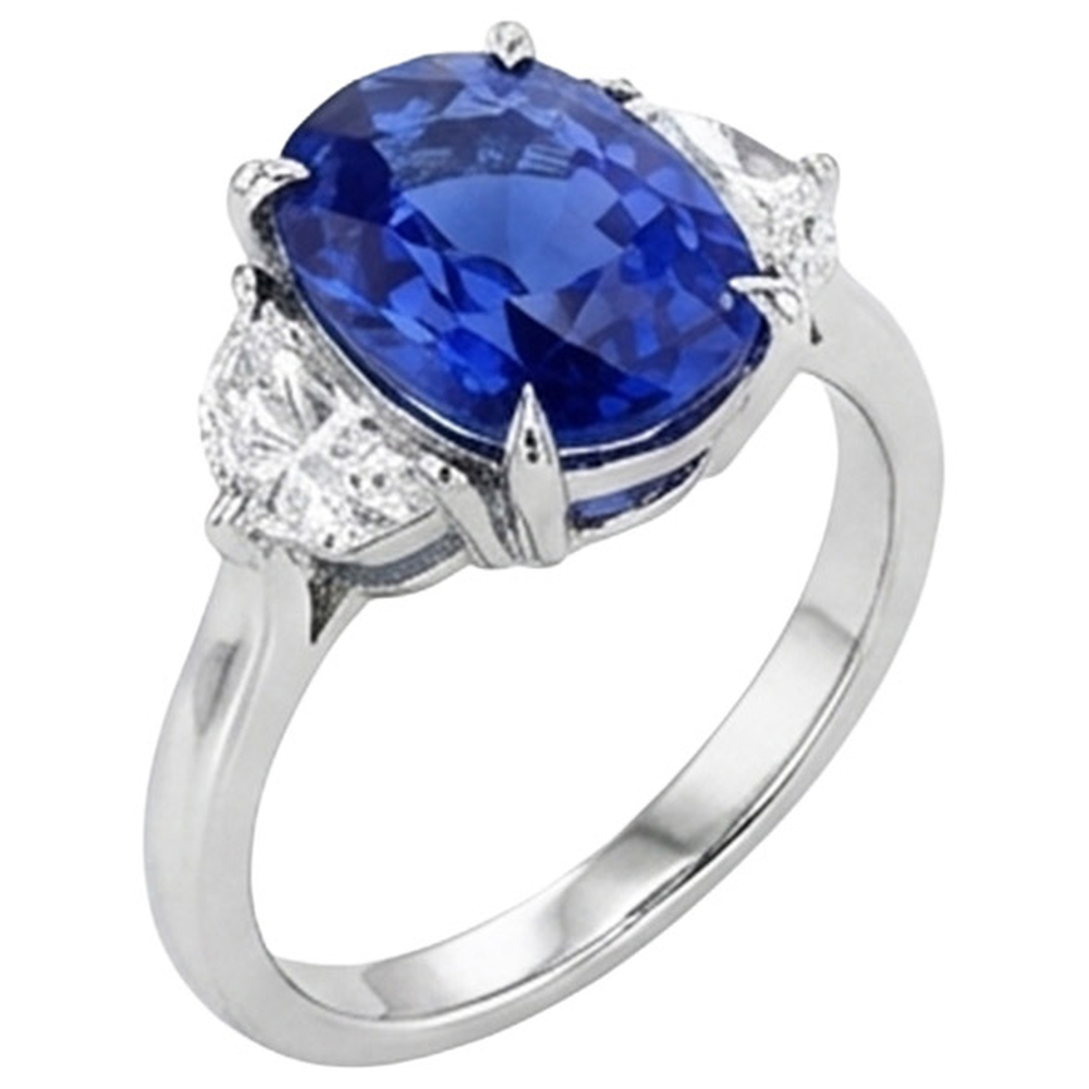 Anello di fidanzamento con tre pietre di diamanti e zaffiro blu. oro 8 carati 14K