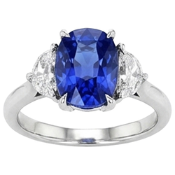 Anello di fidanzamento con tre pietre di diamanti e zaffiro blu. oro 8 carati 14K