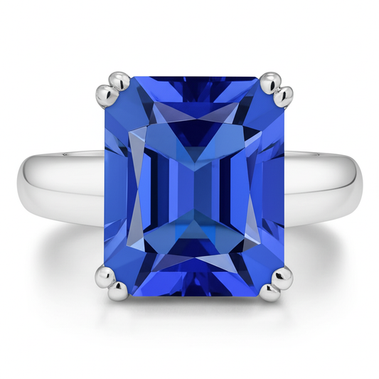 Anello di fidanzamento con zaffiro blu con smeraldo e smeraldo da 2 carati