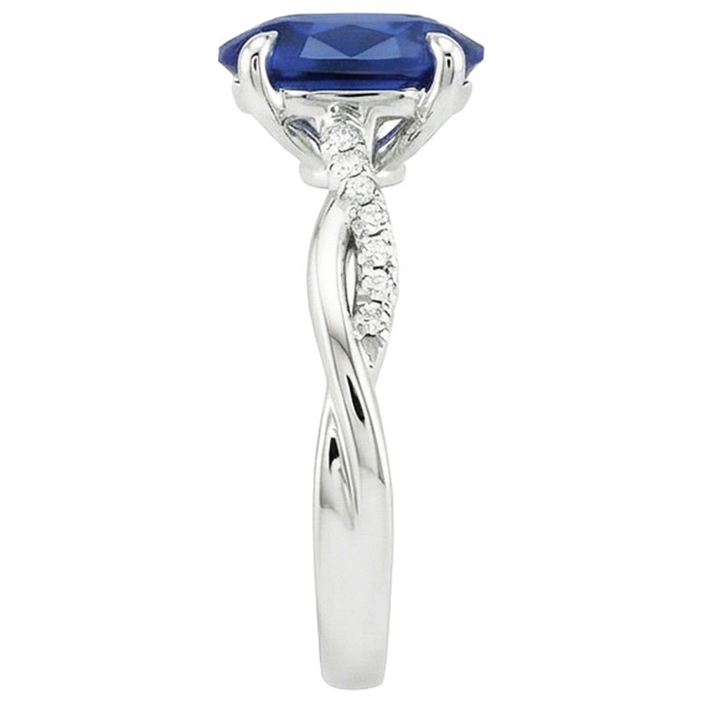 Anello di fidanzamento con zaffiro blu ovale. diamante. gambo intrecciato. 6 carati