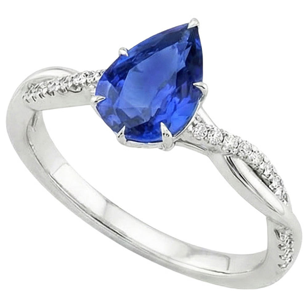 Anello di fidanzamento da donna con diamante e pera. zaffiro blu. oro bianco 5 carati