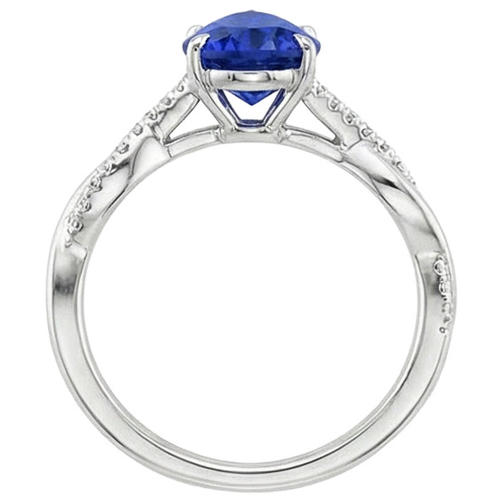 Anello di fidanzamento da donna con diamante e pera. zaffiro blu. oro bianco 5 carati