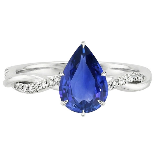 Anello di fidanzamento da donna con diamante e pera. zaffiro blu. oro bianco 5 carati