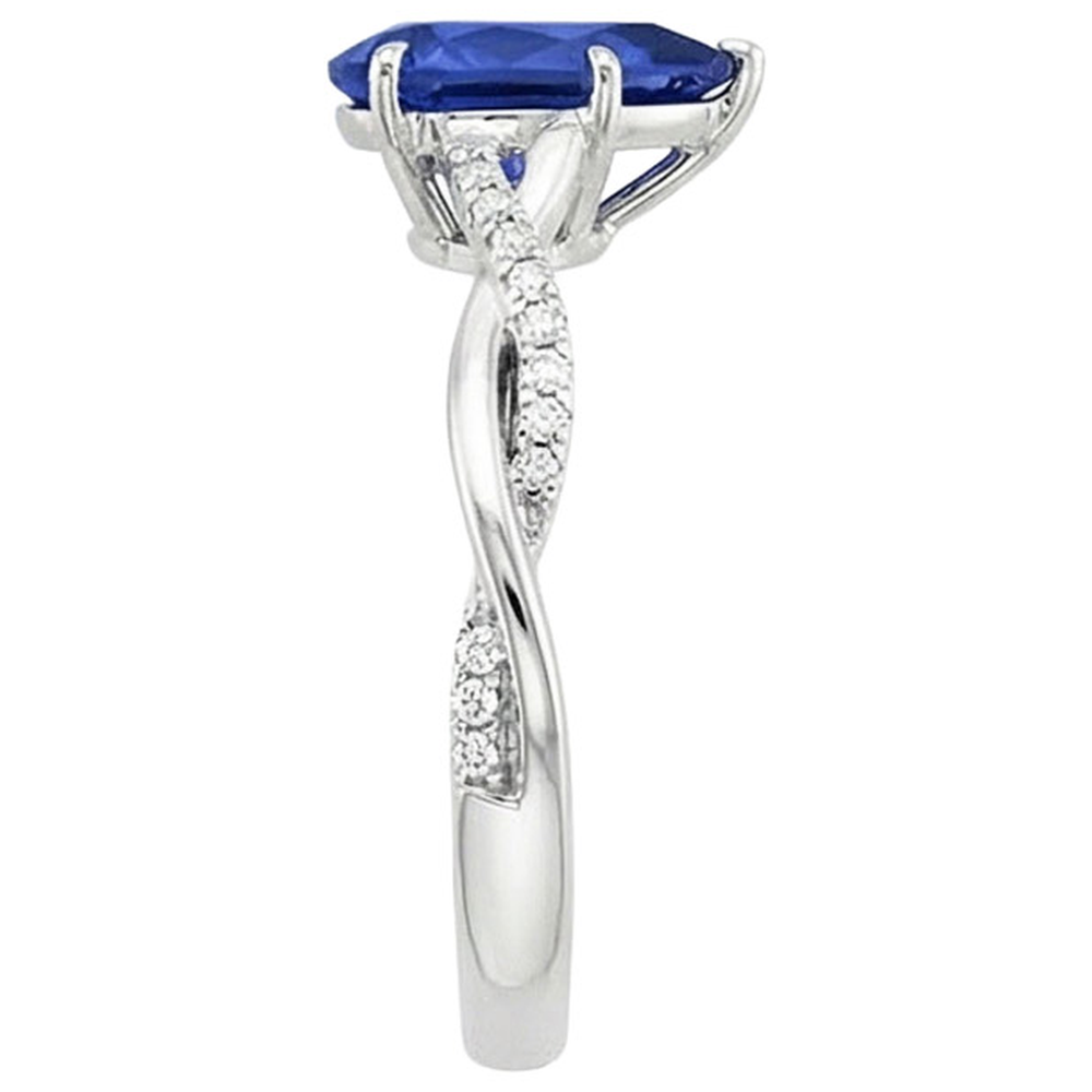 Anello di fidanzamento da donna con diamante e pera. zaffiro blu. oro bianco 5 carati