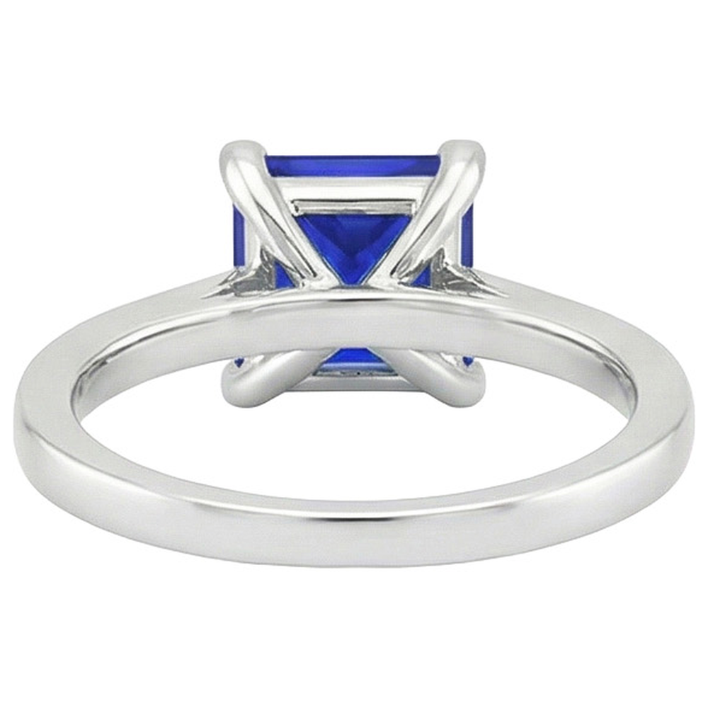 Anello di fidanzamento in oro bianco con zaffiro blu principessa e diamante 4 carati