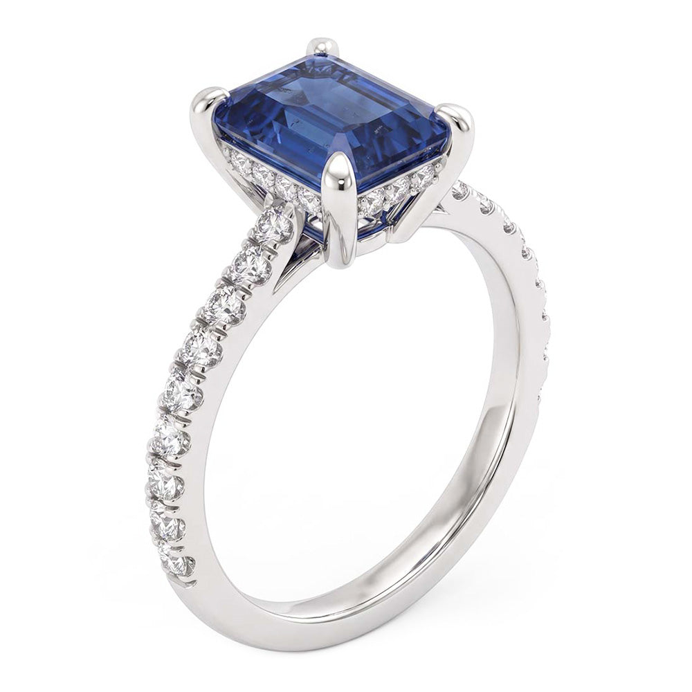 Anello di fidanzamento in oro con zaffiro blu smeraldo e pavé di diamanti 2.50 carati