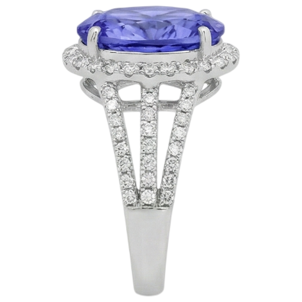 Anello fantasia con tanzanite ovale da 5.80 carati e diamante rotondo in oro bianco 14K