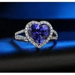 Anello fantasia in oro bianco 14 carati con diamanti e zaffiri a taglio cuore blu da 4.45 ct - harrychadent.it