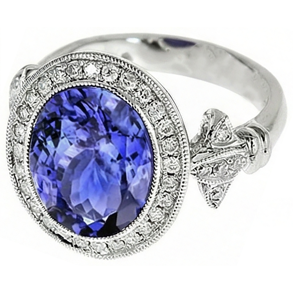Anello fantasia in tanzanite 9 carati con piccoli diamanti in oro bianco 14K
