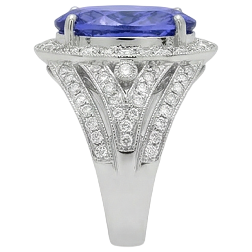 Anello fantasia tanzanite ovale centrale da 6.55 carati oro bianco 14K