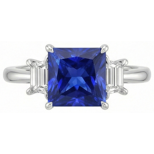 Anello in oro 3 pietre con zaffiro blu principessa e diamanti trapezoidali 4 carati