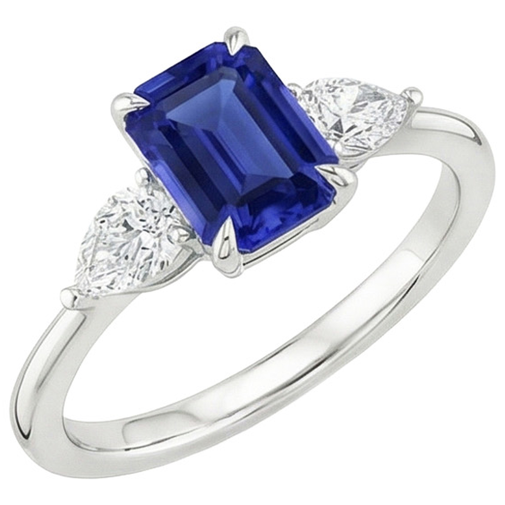 Anello in oro 3 pietre con zaffiro blu taglio smeraldo e diamante a pera 3.50 carati
