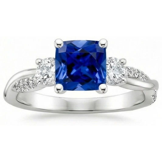 Anello in oro 3 pietre stile cuscino zaffiro blu con accenti 2.75 carati