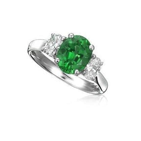 Anello in oro bianco 14 carati con 3 pietre di Verde smeraldo e diamanti taglio ovale 6.50 carati