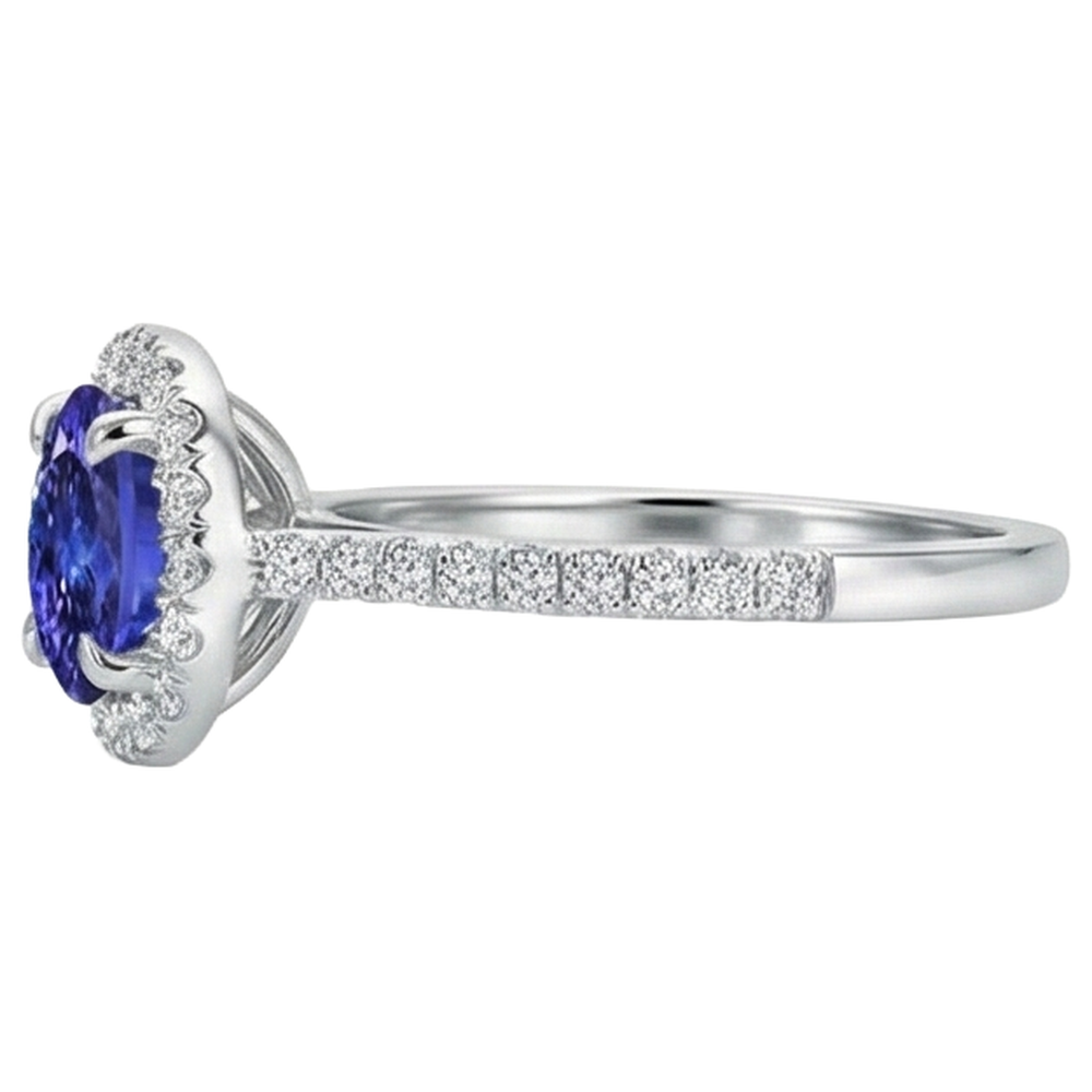 Anello in oro bianco 14 carati con tanzanite a taglio rotondo e diamanti da 9.85 ct