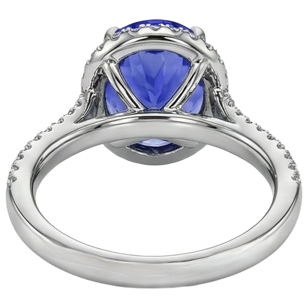 Anello in oro bianco 14 carati con tanzanite da 6.85 ct con aureola e diamanti