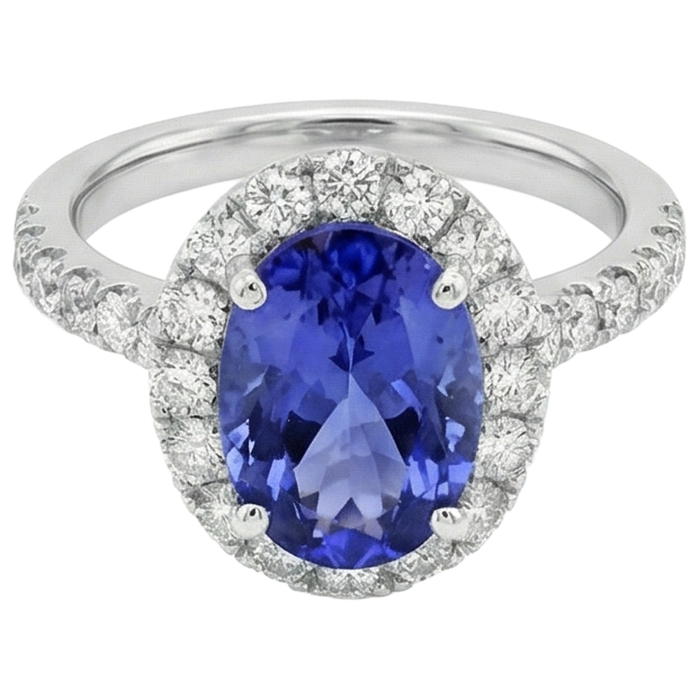 Anello in oro bianco 14 carati con tanzanite ovale da 11.25 carati con diamanti rotondi