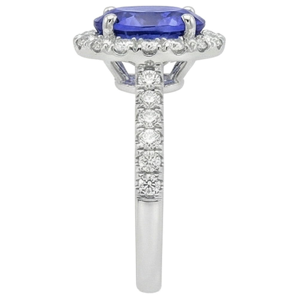 Anello in oro bianco 14 carati con tanzanite ovale da 11.25 carati con diamanti rotondi