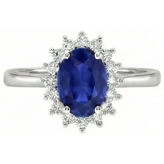 Anello in oro bianco 14 carati con zaffiro blu taglio ovale 2.50 carati e diamanti