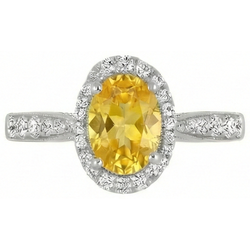 Anello in oro bianco 14 carati con zaffiro giallo ovale e diamanti rotondi da 4.50 ct