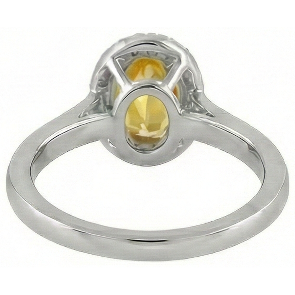 Anello in oro bianco 14 carati con zaffiro giallo ovale e diamanti rotondi da 4.50 ct