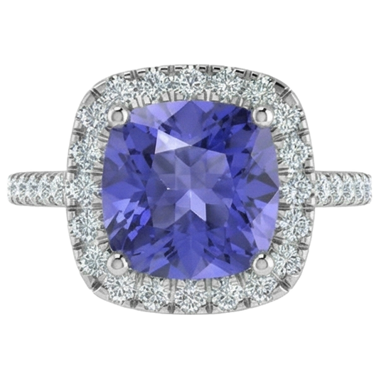 Anello in oro bianco 14 kt con tanzanite blu da 4.50 ct con diamanti