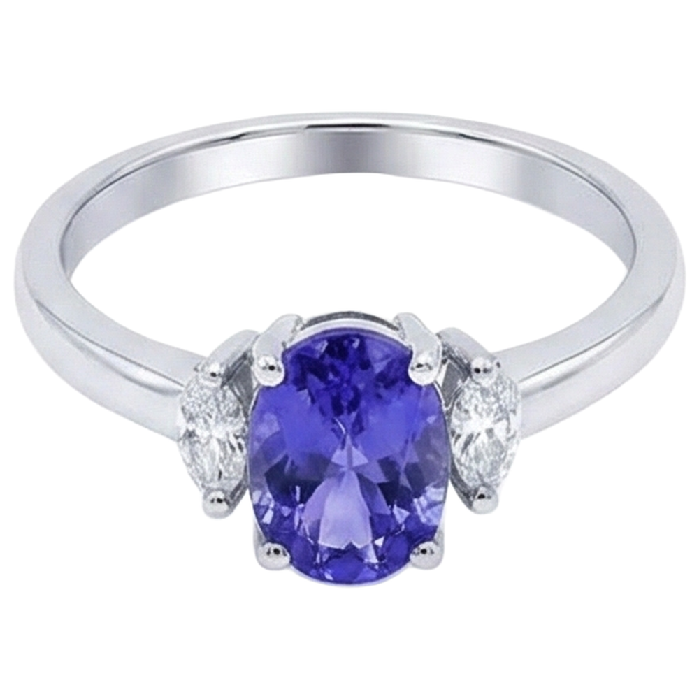 Anello in oro bianco 14 kt con tre pietre di tanzanite e diamanti da 3.50 carati