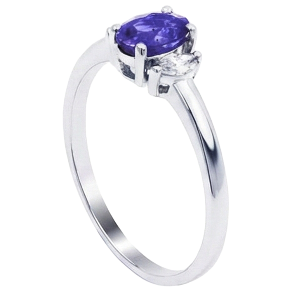 Anello in oro bianco 14 kt con tre pietre di tanzanite e diamanti da 3.50 carati