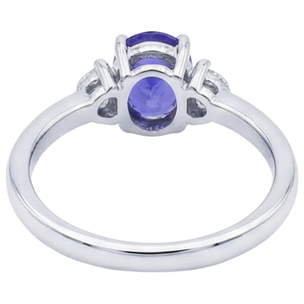 Anello in oro bianco 14 kt con tre pietre di tanzanite e diamanti da 3.50 carati