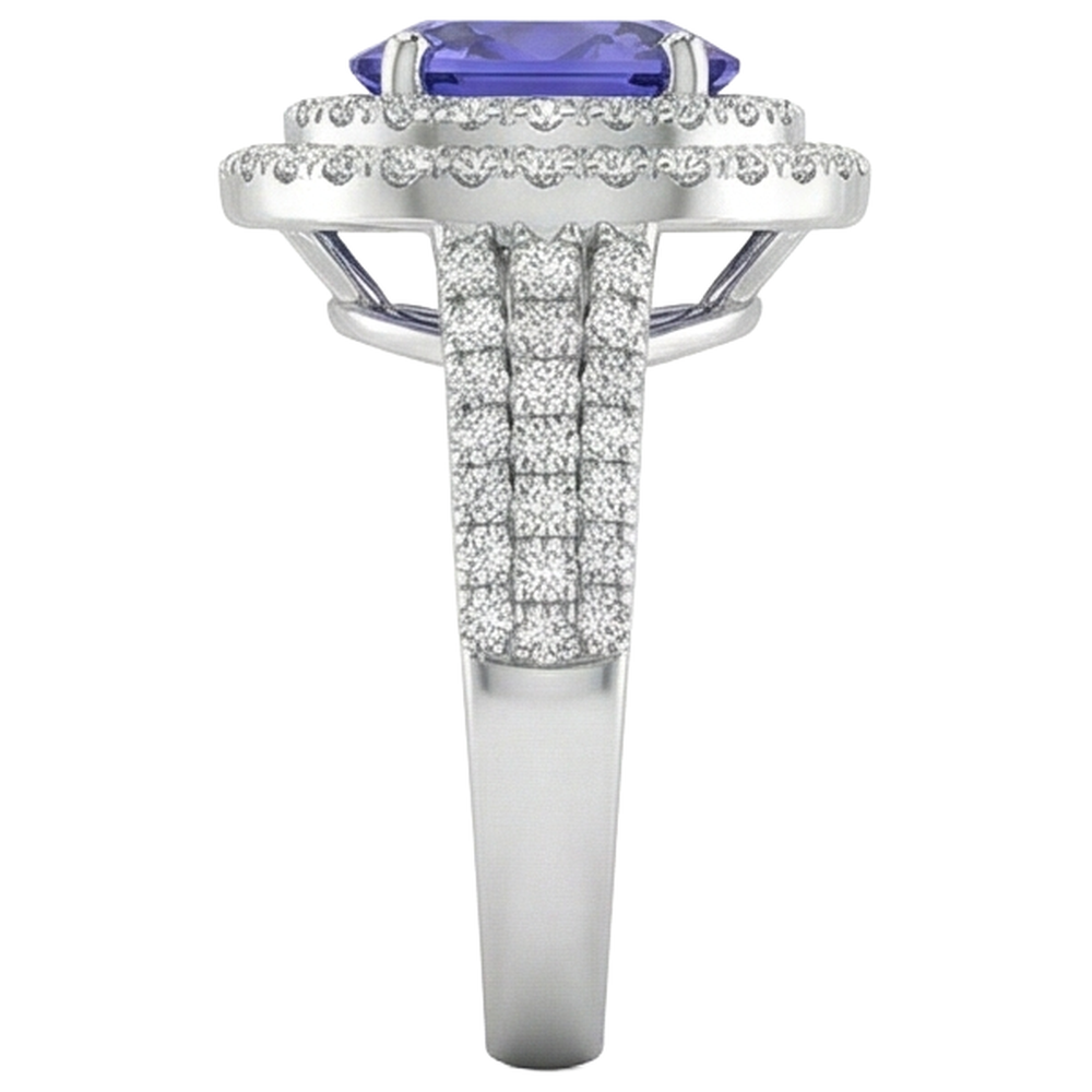 vero round tanzanite 5.25carati anello su bianco