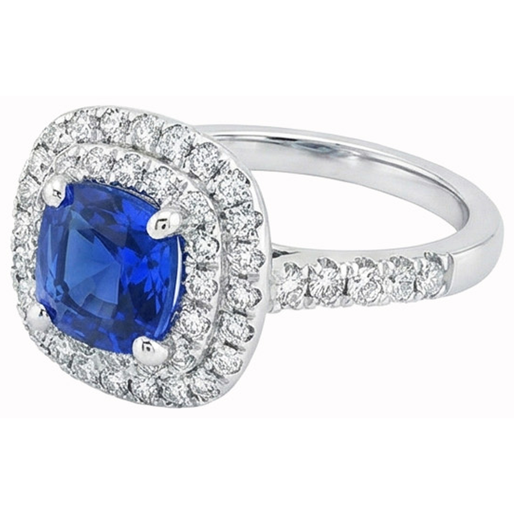 Anello in oro bianco 14K con zaffiro a cuscino blu da 2 ct e diamante rotondo aureola