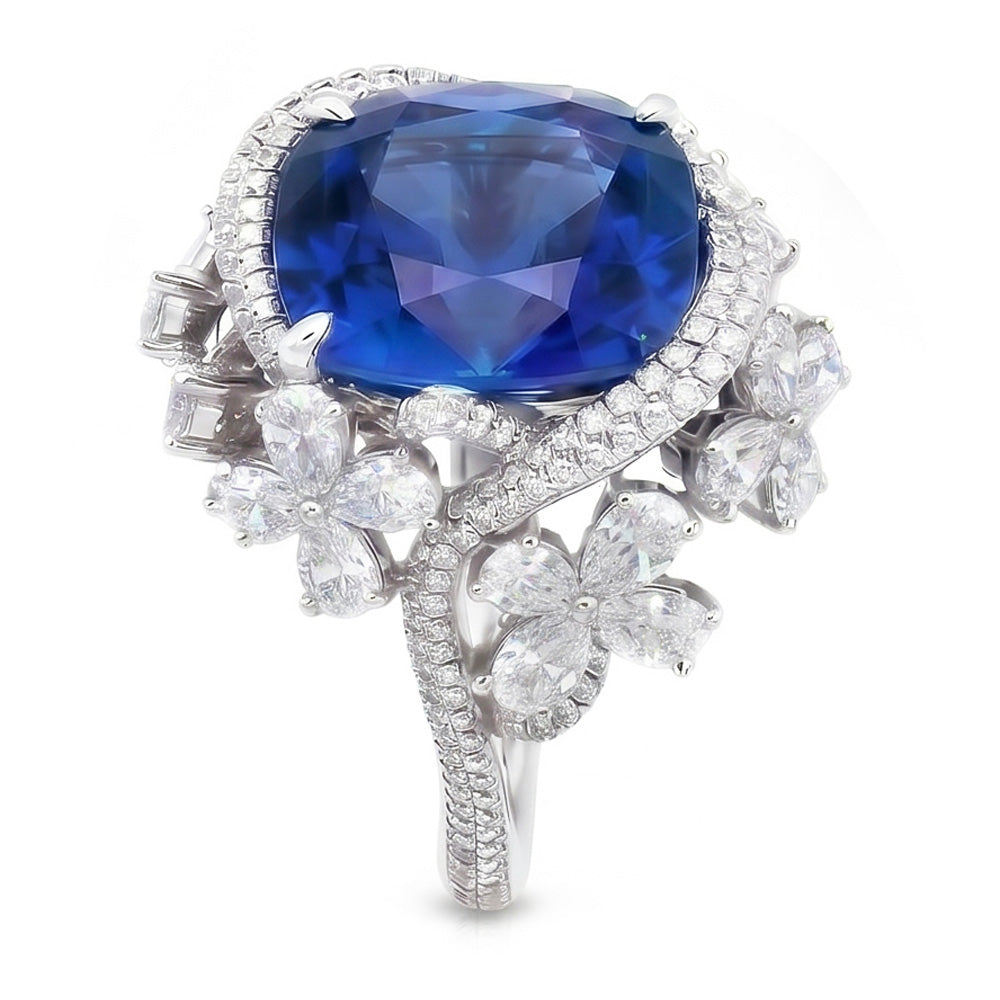 Anello in oro bianco 14K con zaffiro blu taglio pera e diamanti 9.50 carati
