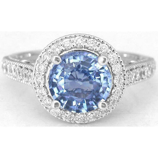 Anello in oro bianco 14 carati con zaffiro di Ceylon a taglio rotondo da 4.86 ct - harrychadent.it