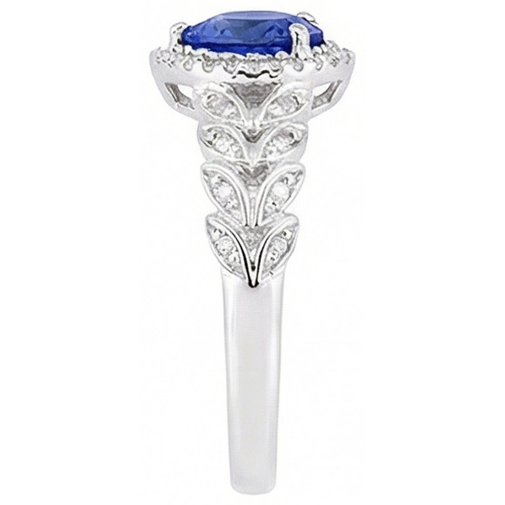 Anello in oro bianco a forma di cuore con zaffiro blu a forma di foglia 2.50 carati