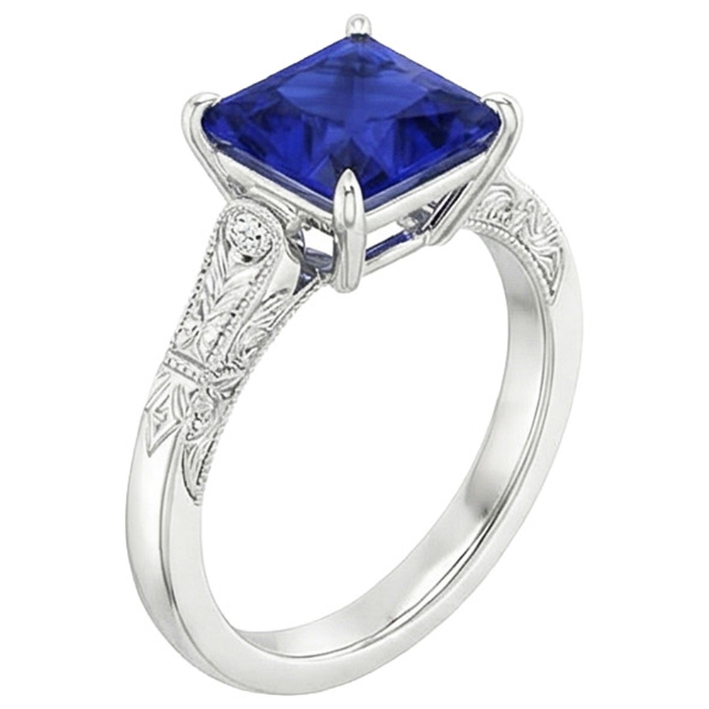 Anello in oro bianco con 3 pietre di diamanti e zaffiro blu principessa 5.25 carati