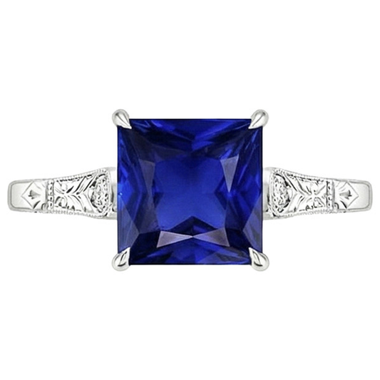 Anello in oro bianco con 3 pietre di diamanti e zaffiro blu principessa 5.25 carati