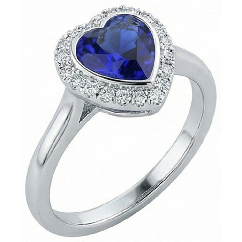 Anello in oro bianco con anello a forma di cuore con zaffiro blu intenso 4 carati