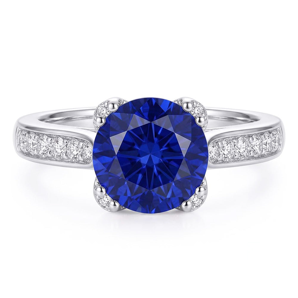 Anello in oro bianco con diamante zaffiro blu intenso con accenti 2.50 carati