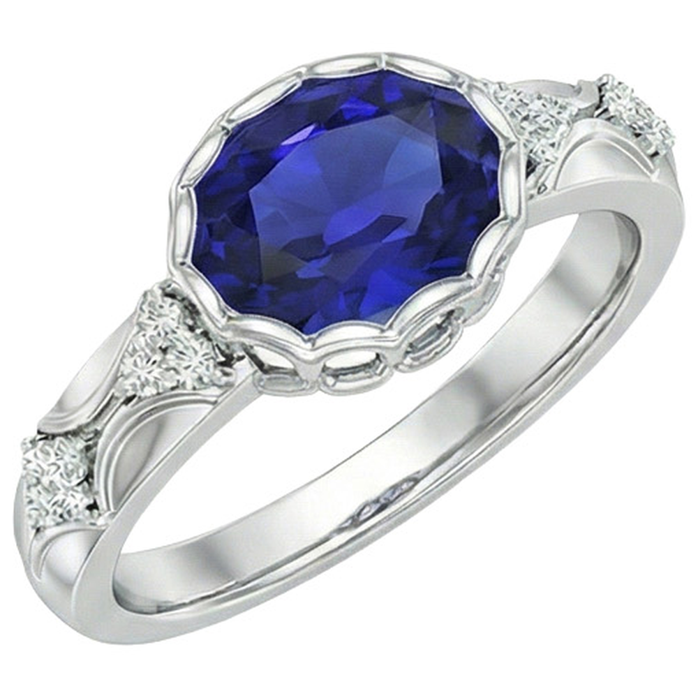 Anello in oro bianco con diamanti da donna. lunetta con zaffiro blu ovale. 3.75 carati