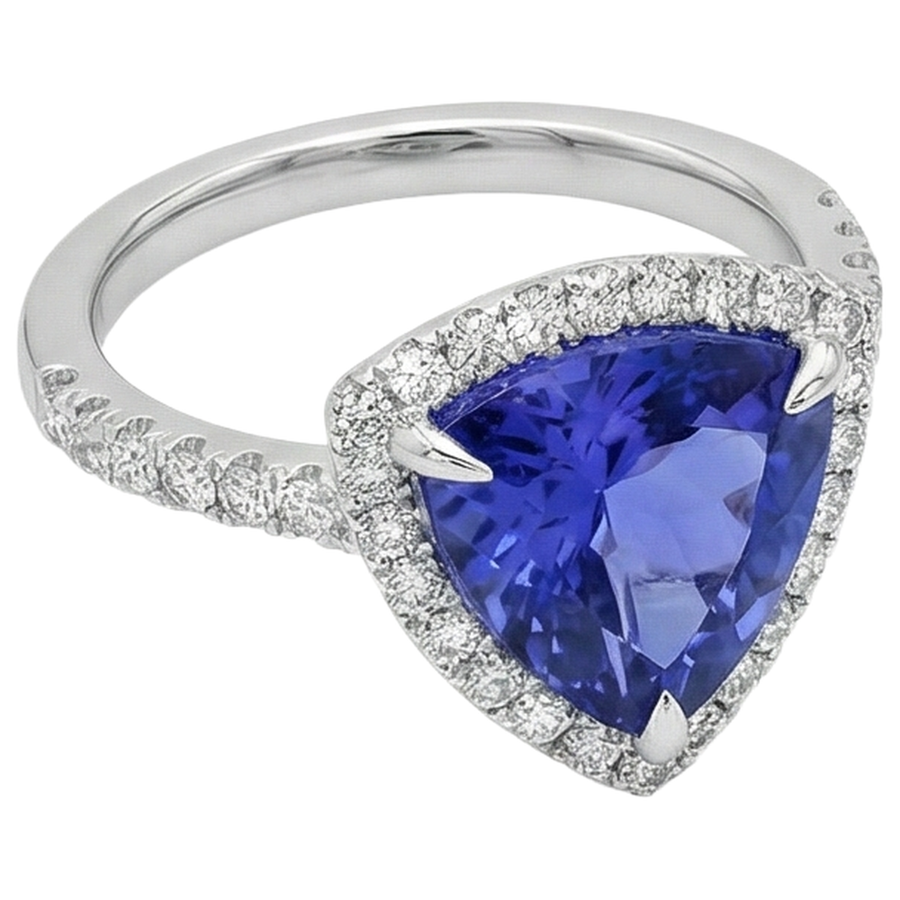 Anello in oro bianco con tanzanite a forma di trilioni di 9 carati con diamanti rotondi