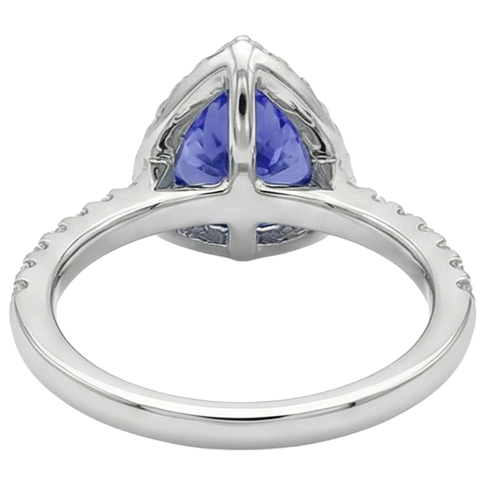 Anello in oro bianco con tanzanite a forma di trilioni di 9 carati con diamanti rotondi