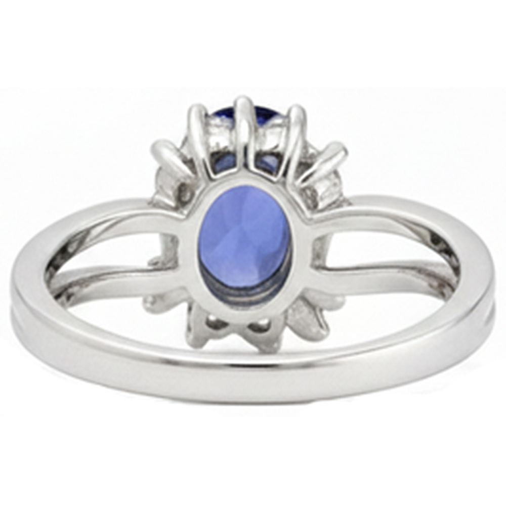 Anello in oro bianco con tanzanite ovale stile antico e diamanti 2.05 carati