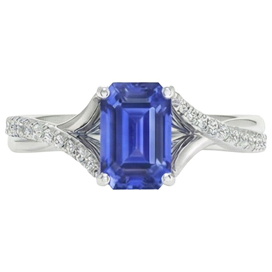 Anello in oro bianco con zaffiro dello Sri Lanka taglio smeraldo e diamante 5.25 carati