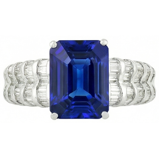 Anello in oro bianco con zaffiro di Ceylon da 7,50 ct, smeraldo e diamanti baguette