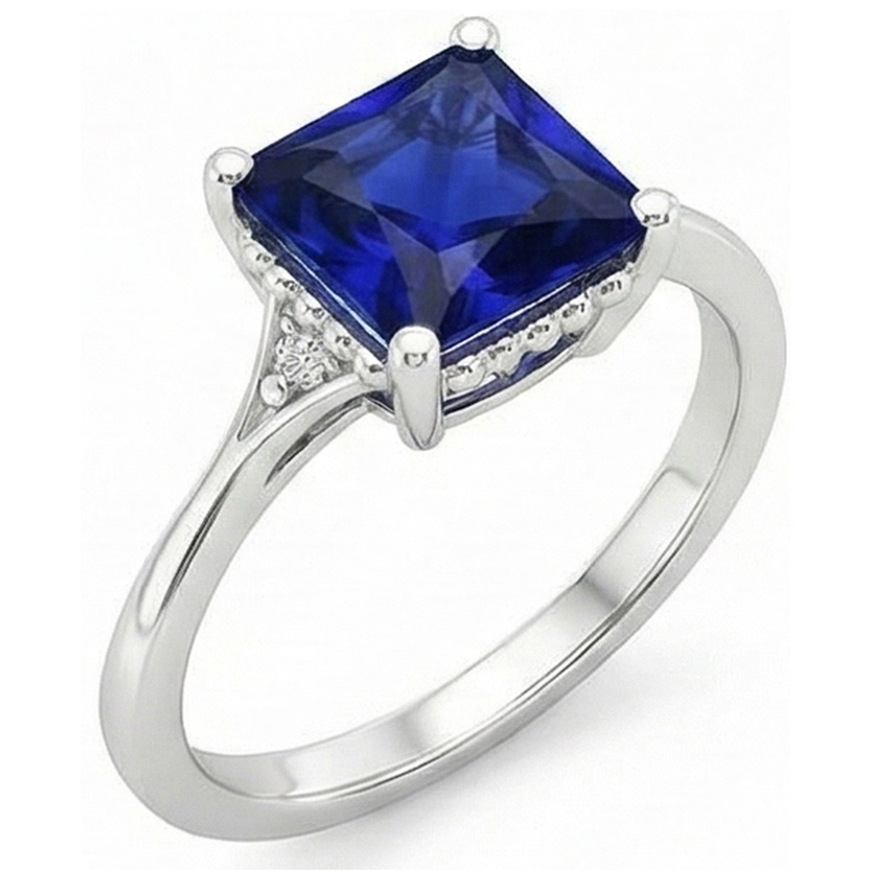 Anello in oro con 3 pietre. diamanti e zaffiro blu. gambo diviso 5.25 carati