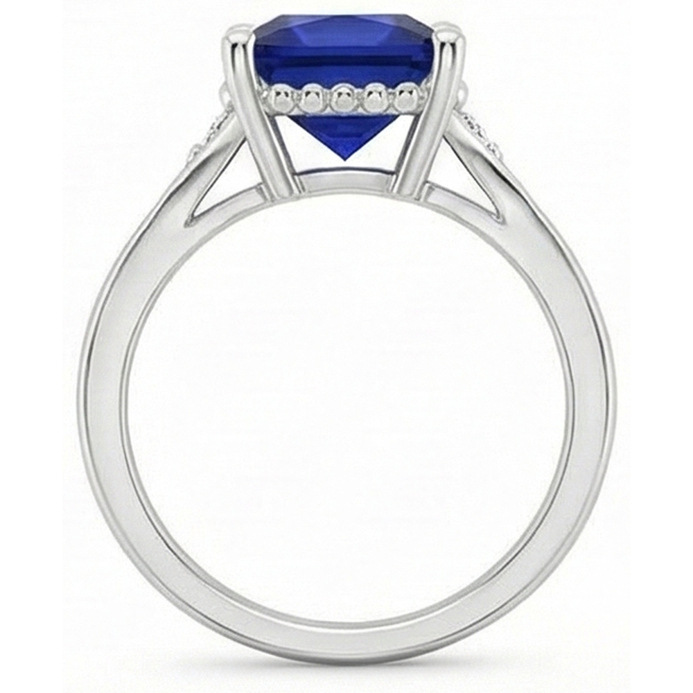 Anello in oro con 3 pietre. diamanti e zaffiro blu. gambo diviso 5.25 carati