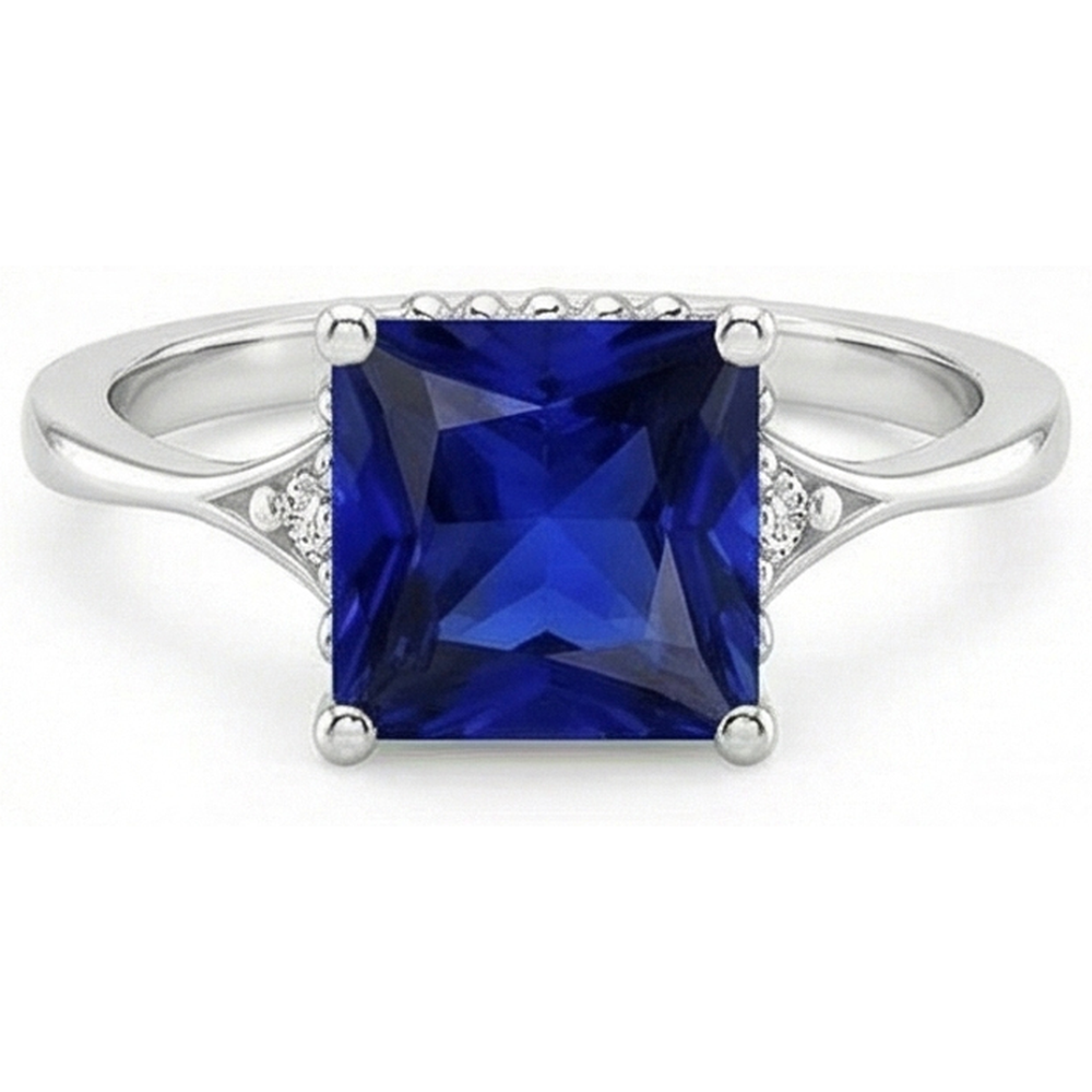 Anello in oro con 3 pietre. diamanti e zaffiro blu. gambo diviso 5.25 carati